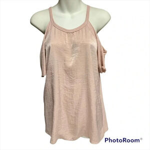 Socialite pink cold shoulder top size XS has a pearly shine to it